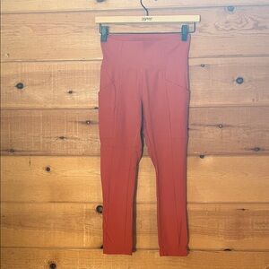 REI orange leggings